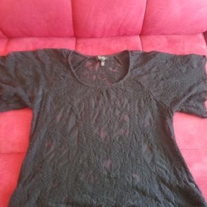 Black Jessica Simpson knit top.